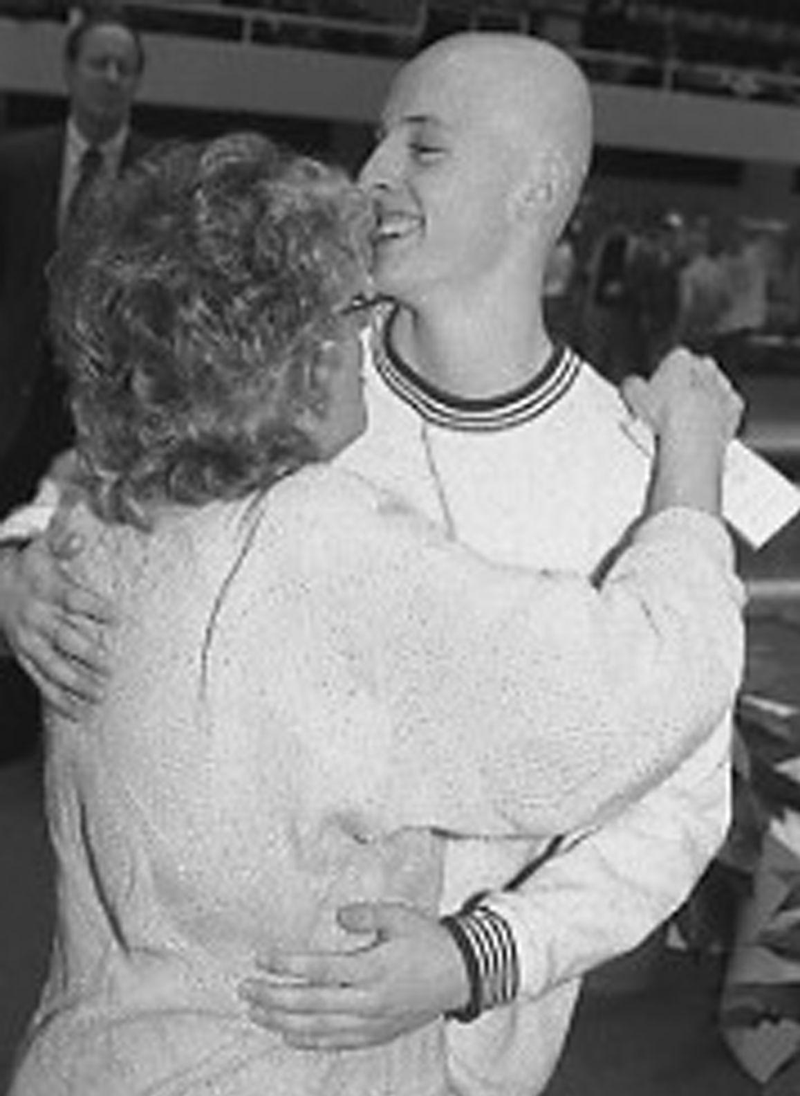 Andy Kryder hugging mom 1994 state meet